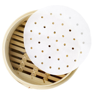 Feuille papier de cuisson ronde perfor&eacute;e pour panier vapeur (x75)